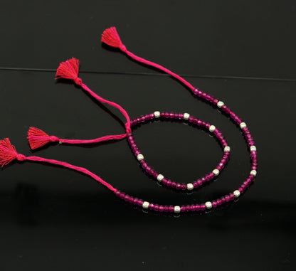 Fabulous Threads anklet featuring semi-precious ruby stones and 925 silver beads, handcrafted modern beaded jewelry ankle bracelet.