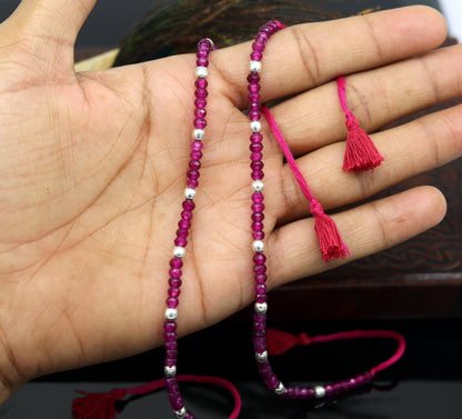 Semi-precious ruby stone and 925 silver beads on a custom-made anklet from Tribal Ornaments, modern beaded jewelry for ankles.