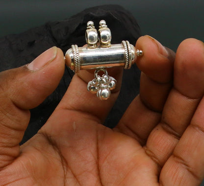 Fine 925 silver amulet pendant with a plain shine design, stylish jewelry featuring jingling bells, by TRIBAL ORNAMENTS.