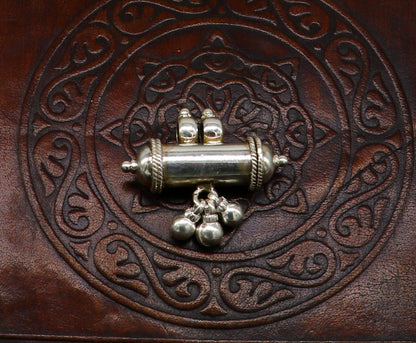 Fine 925 silver amulet pendant with plain shine design, stylish jewelry featuring jingling bells, elegant and unique accessory.