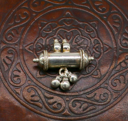 Fine 925 silver amulet pendant with a plain shine design, stylish jewelry featuring jingling bells, ideal for elegant gifting.