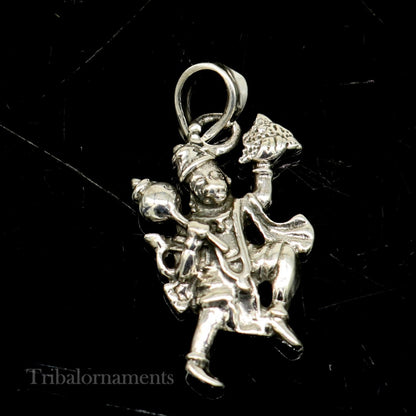 Sterling silver Flying Hanuman pendant with detailed craftsmanship, handmade jewelry by TRIBAL ORNAMENTS featuring a divine god idol.