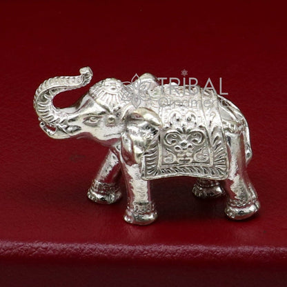 Solid 925 sterling silver elephant figurine sculpture by Tribal Ornaments, showcasing detailed craftsmanship for wealth and prosperity.