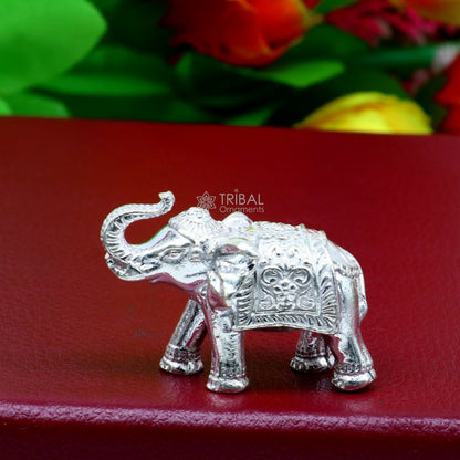 Solid 925 Sterling silver elephant statue sculpture by TRIBAL ORNAMENTS, detailed figurine symbolizing wealth and prosperity.