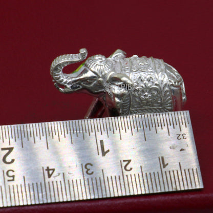 Solid 925 Sterling silver elephant figurine sculpture by Tribal Ornaments, detailed decorative art for wealth and prosperity.