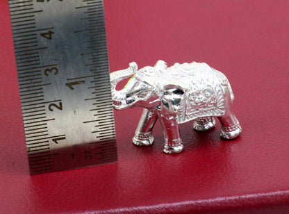 Solid 925 Sterling silver elephant figurine sculpture by TRIBAL ORNAMENTS, detailed wealth and prosperity art decoration.