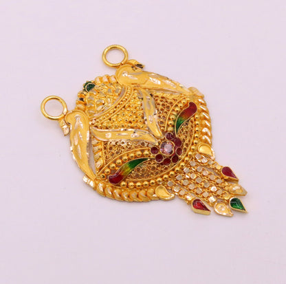 Genuine 22kt yellow gold tribal pendant with filigree and meenakari work, traditional Indian tribal jewelry design.