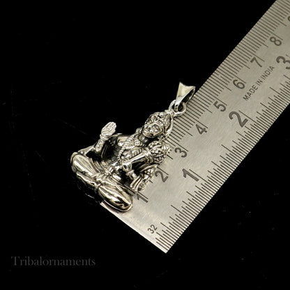 Sterling silver Bajarangbali pendant depicting Lord Hanuman, handmade tribal jewelry by Tribal Ornaments for spiritual gifting.