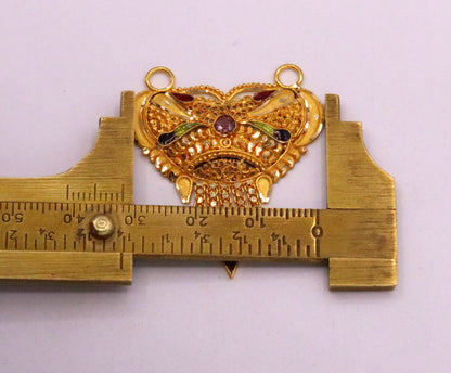 Handcrafted 22KT yellow gold tribal pendant with intricate filigree work, hallmarked 916, traditional Indian tribal jewelry design.