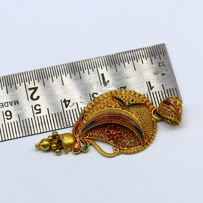 Handcrafted 22KT yellow gold traditional filigree pendant, ethnic bridal jewelry, detailed design, unique cultural craftsmanship.
