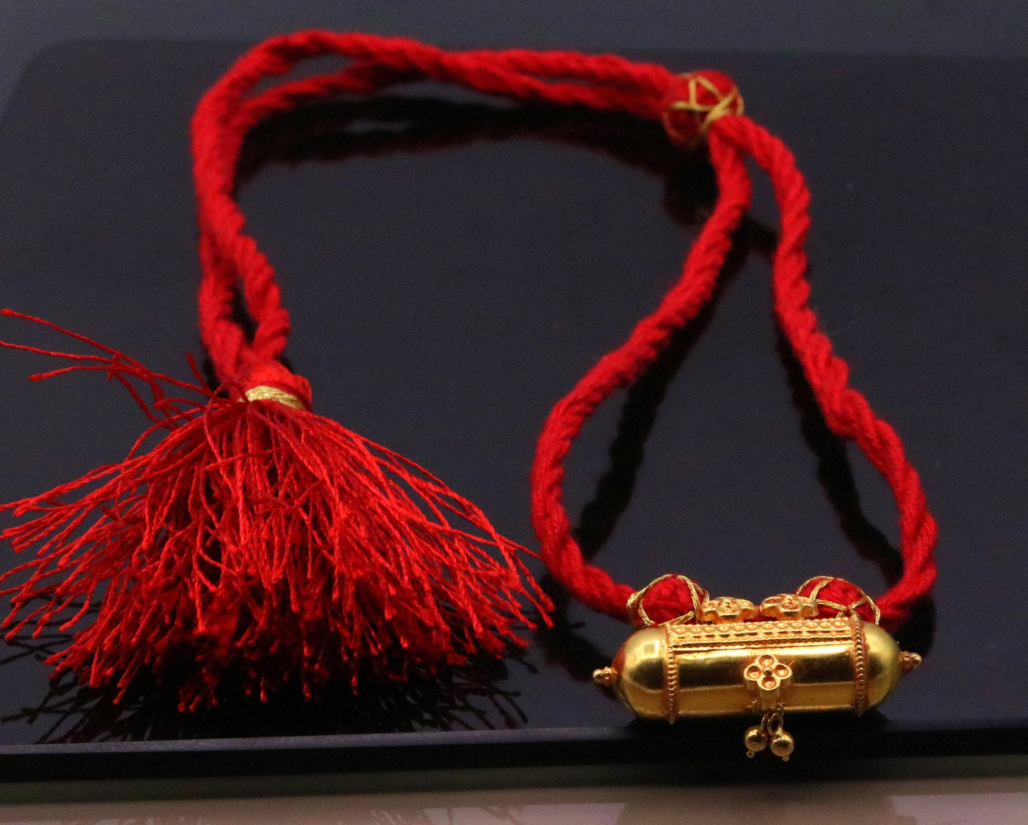 Handmade 20K yellow gold vintage tribal amulet necklace from Rajasthan, India, featuring intricate antique design and unique style.