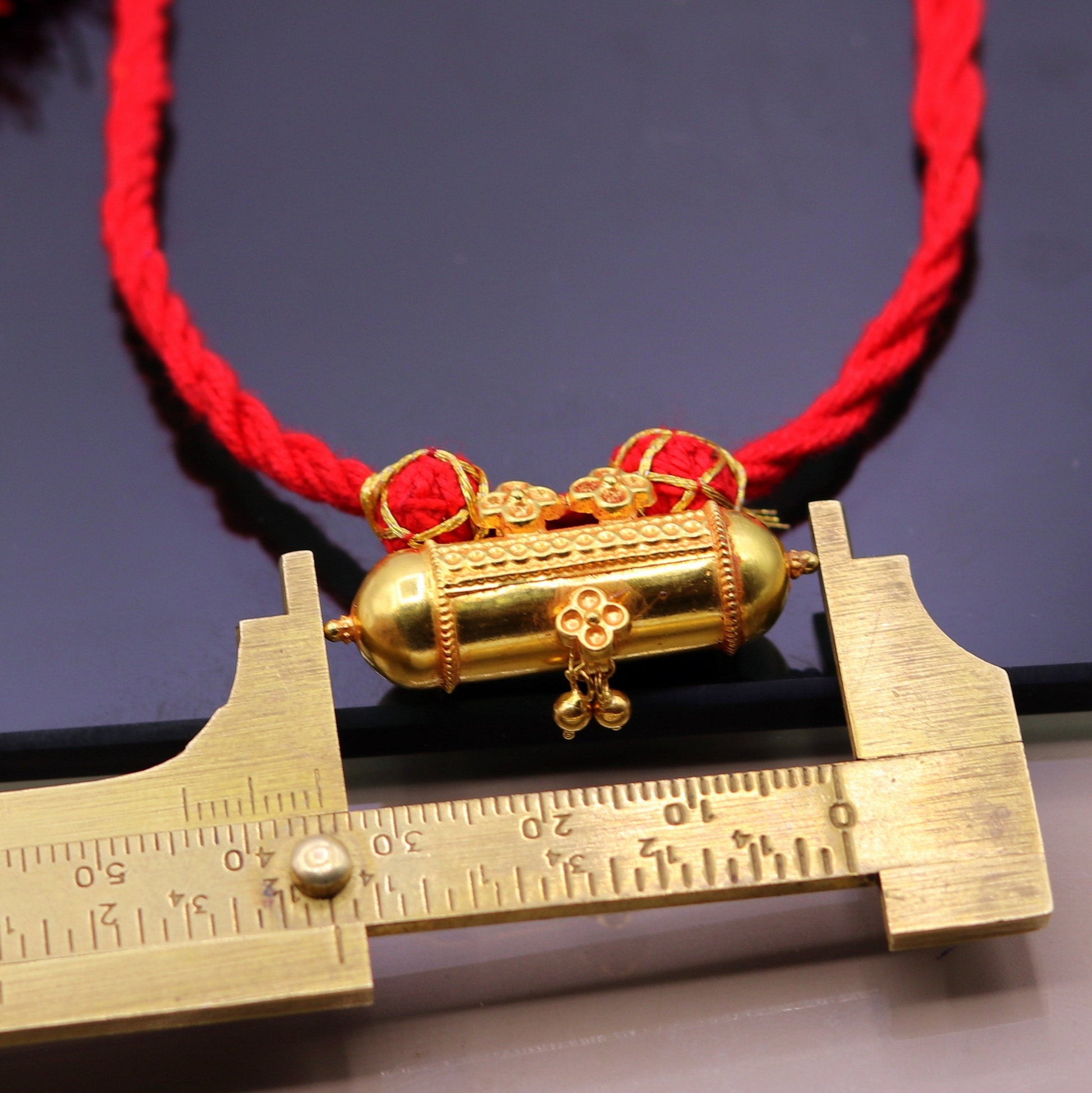 Handmade 20K yellow gold vintage tribal amulet necklace from Rajasthan, India, featuring intricate antique design and unique style.