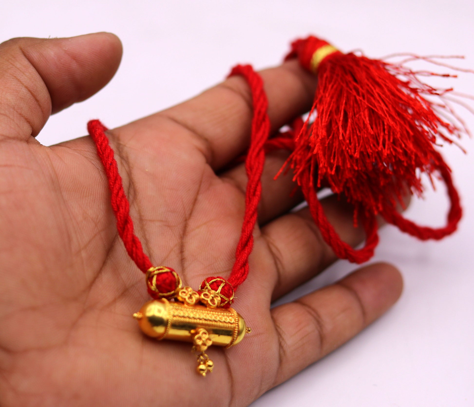 Handmade 20K yellow gold vintage tribal amulet necklace from Rajasthan, India, featuring intricate antique design and unique style.