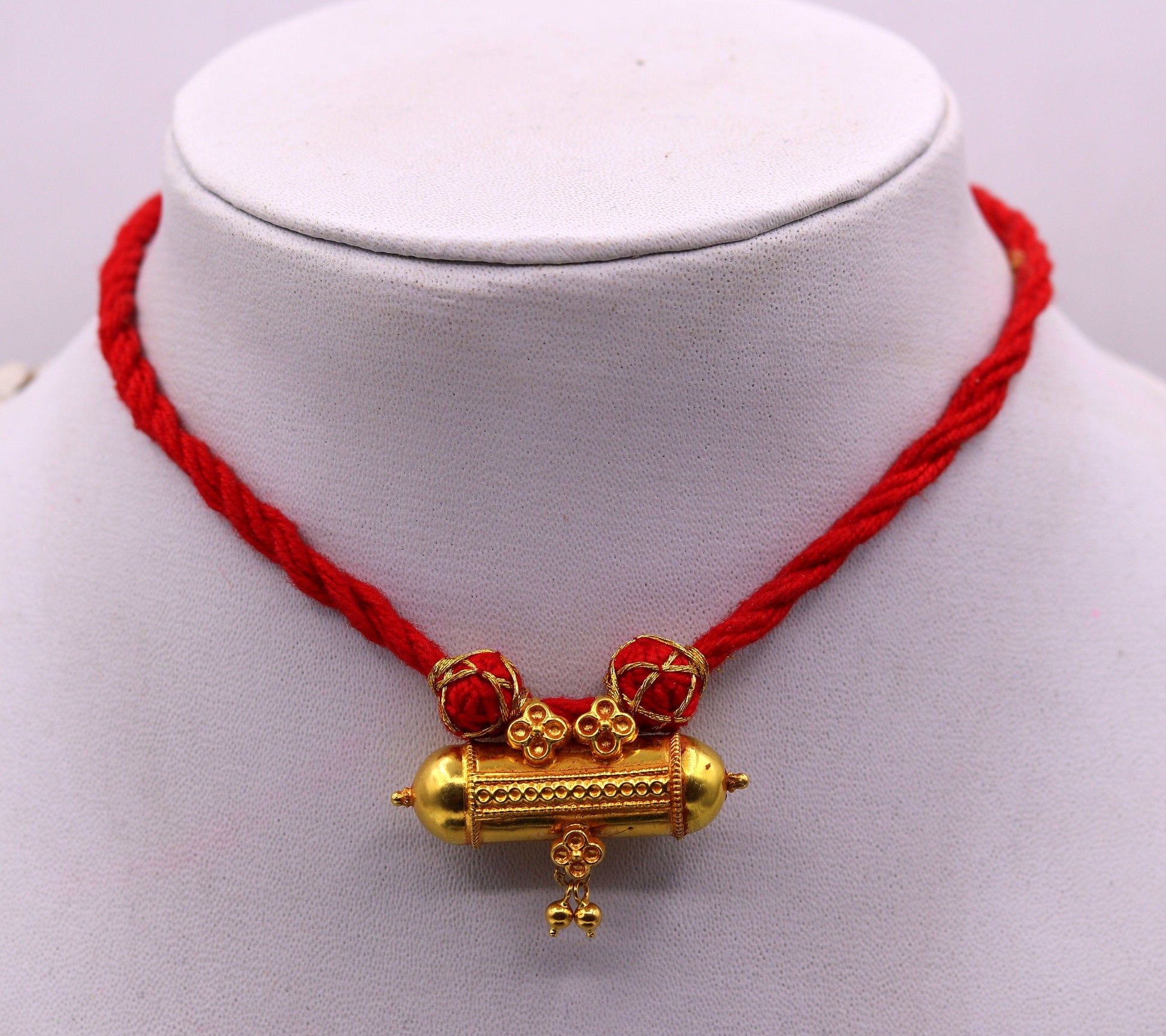 Handmade 20K yellow gold vintage tribal amulet necklace from Rajasthan, India, featuring an antique, unique tribal jewelry design.