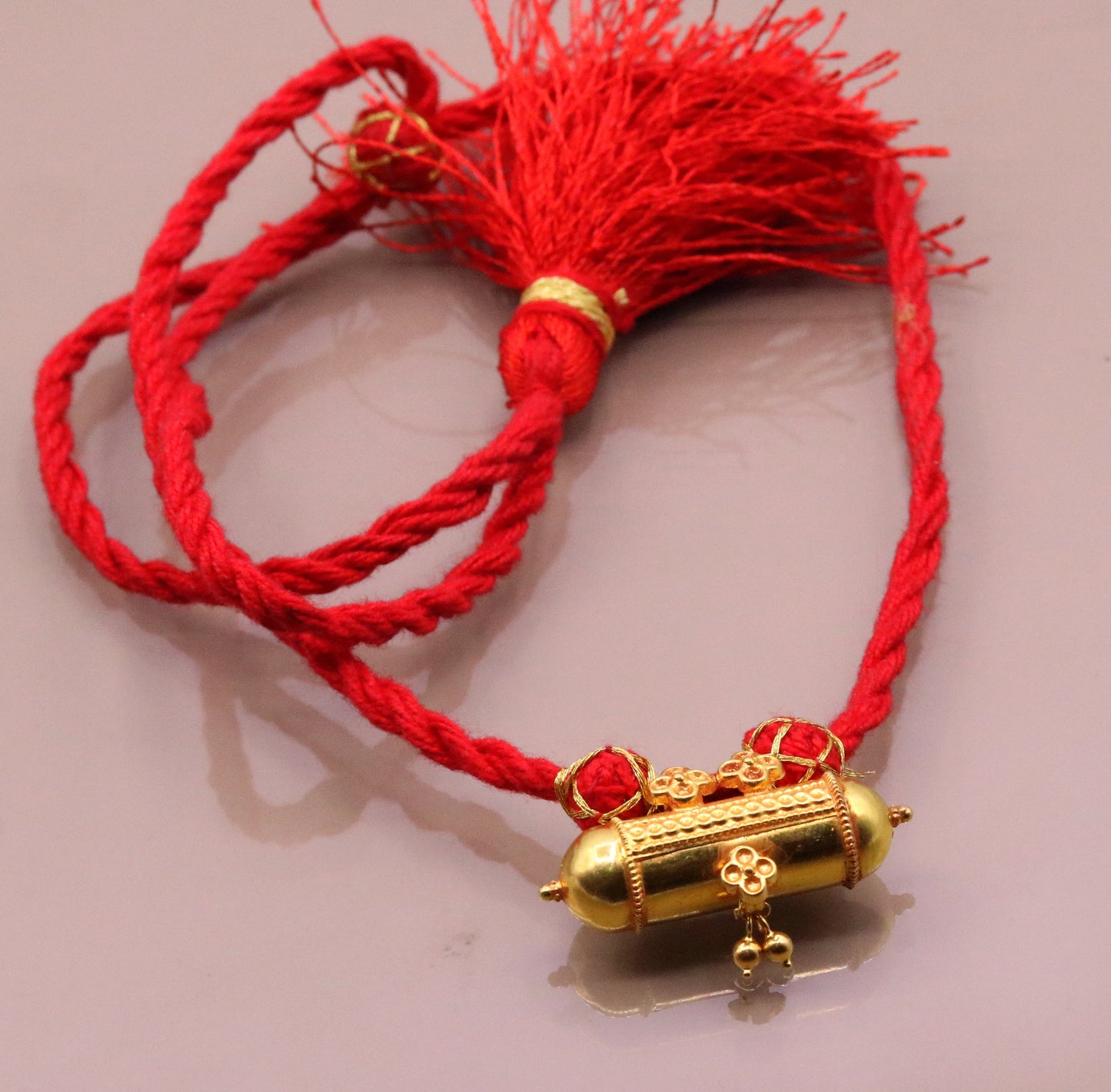 Handmade 20K yellow gold vintage tribal amulet necklace from Rajasthan, India, featuring intricate antique design and unique style.