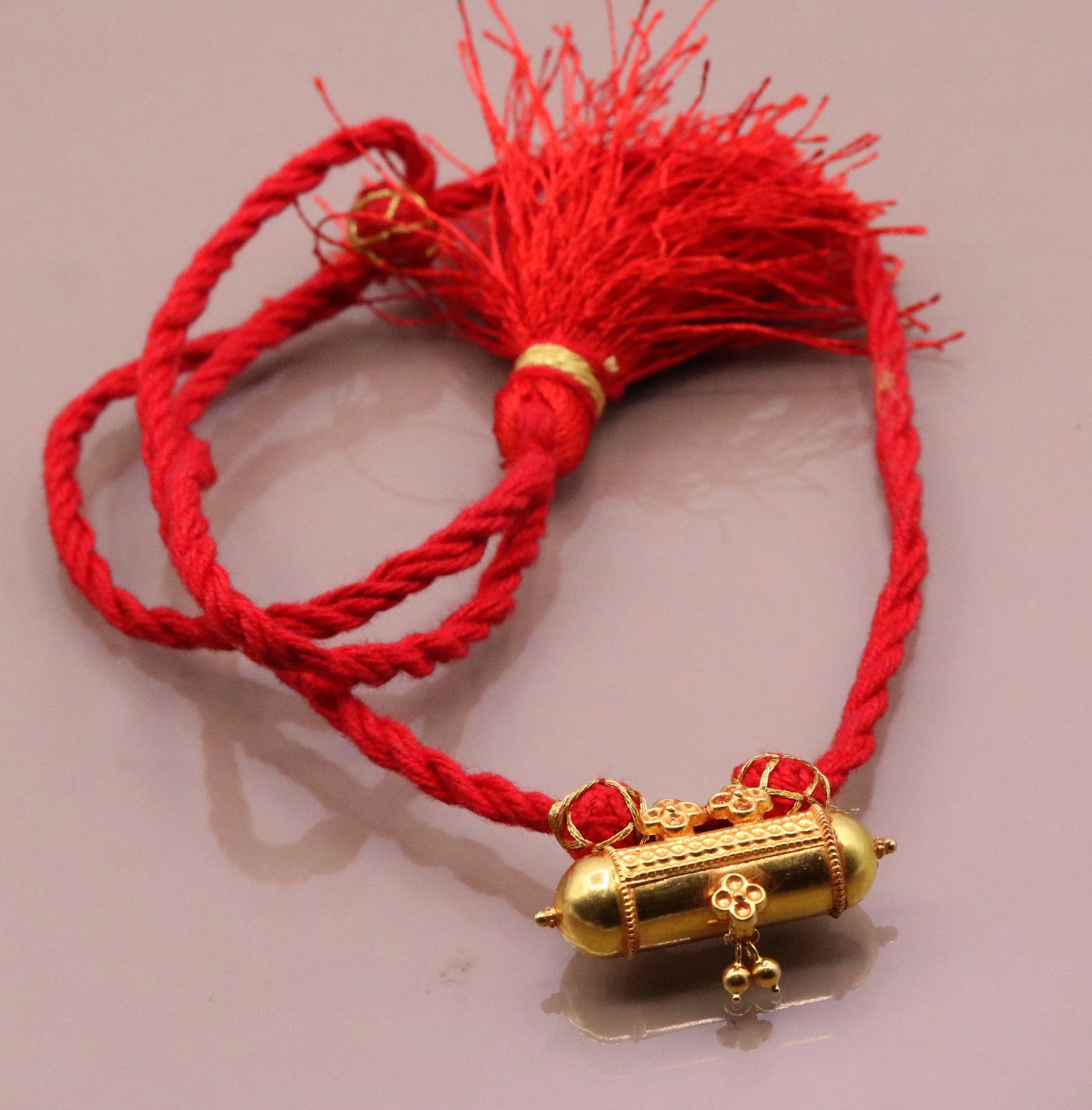 Handmade 20K yellow gold vintage tribal amulet necklace from Rajasthan, India, featuring antique-style jewelry with intricate tribal design.