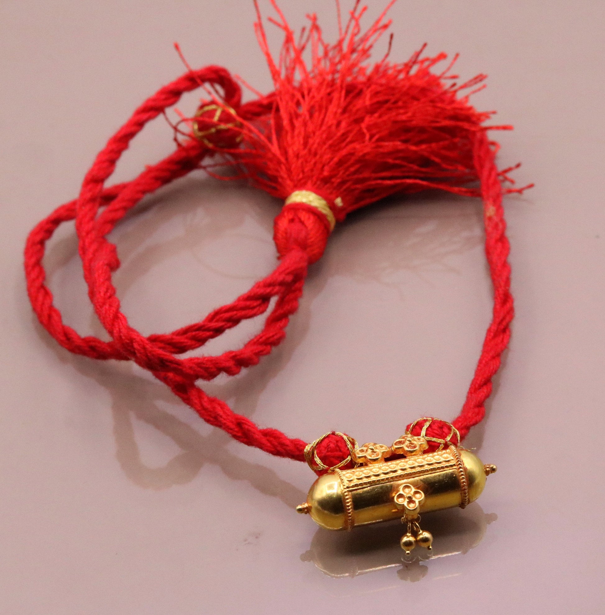 Handmade 20K yellow gold vintage tribal amulet necklace from Rajasthan, India, featuring antique-style jewelry with intricate tribal design.