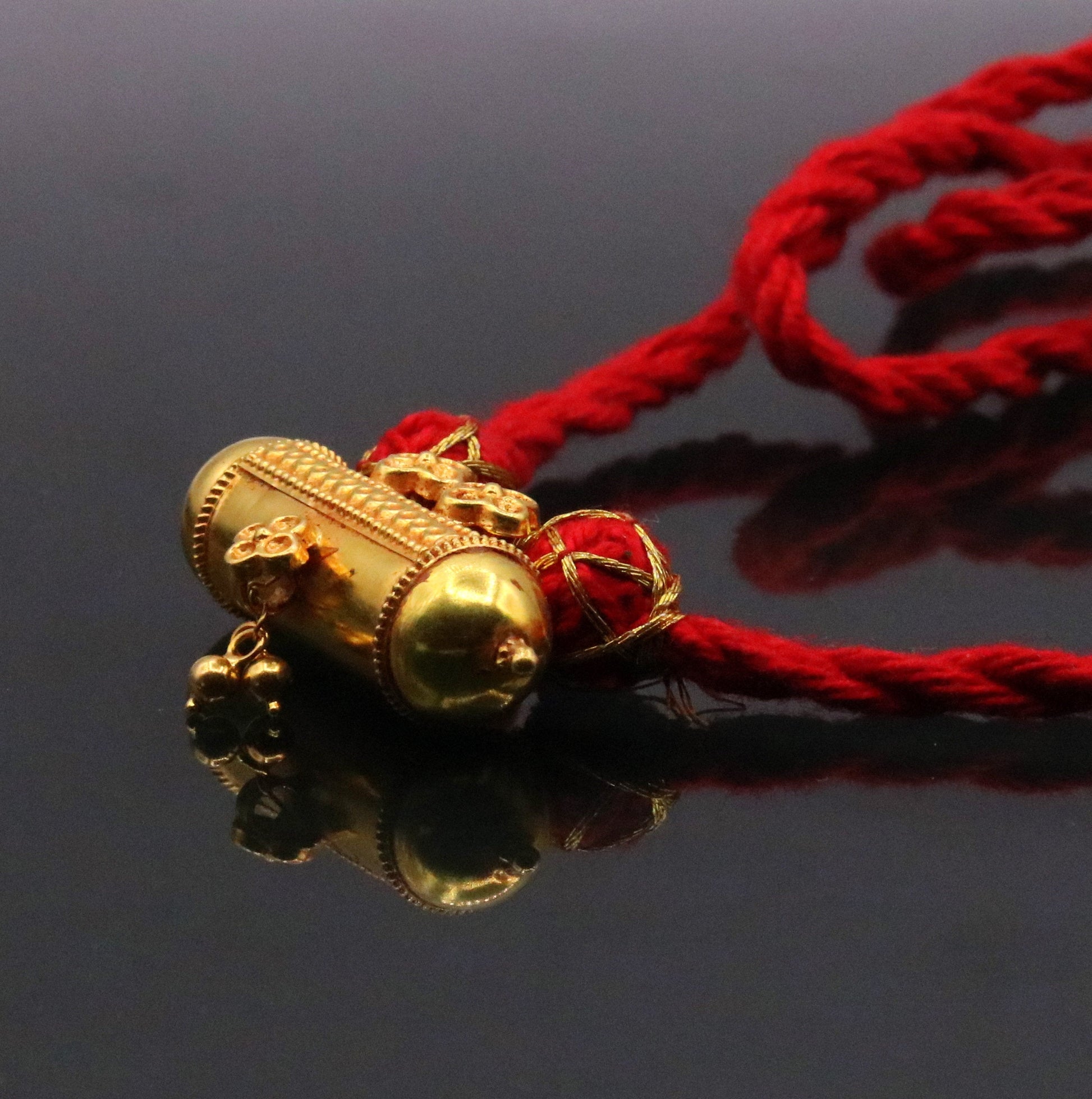 Handmade 20K yellow gold vintage tribal amulet necklace from Rajasthan, India, featuring antique design and unique artisanal craftsmanship.