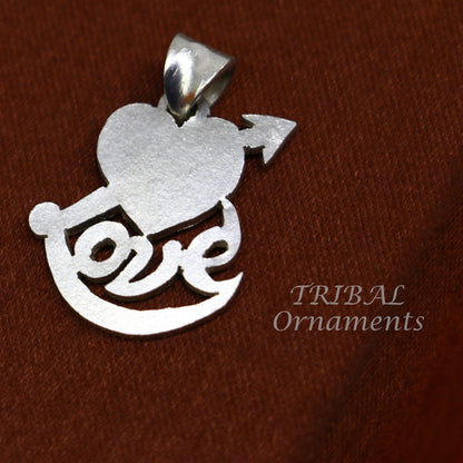 925 sterling silver love design pendant by TRIBAL ORNAMENTS, handmade tribal jewelry with intricate love-themed tribal pattern.