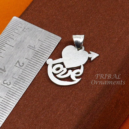 Sterling silver love design pendant by TRIBAL ORNAMENTS featuring intricate tribal jewelry craftsmanship and handmade tribal motifs.
