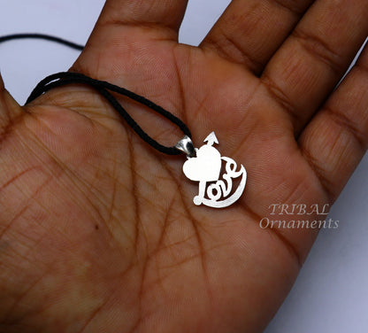 Sterling silver love design pendant by TRIBAL ORNAMENTS featuring intricate tribal jewelry craftsmanship and unique handmade style.