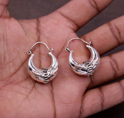 Handmade 925 sterling silver Bali earrings with tribal ethnic design, stylish hoops suitable for unisex jewelry from Rajasthan India
