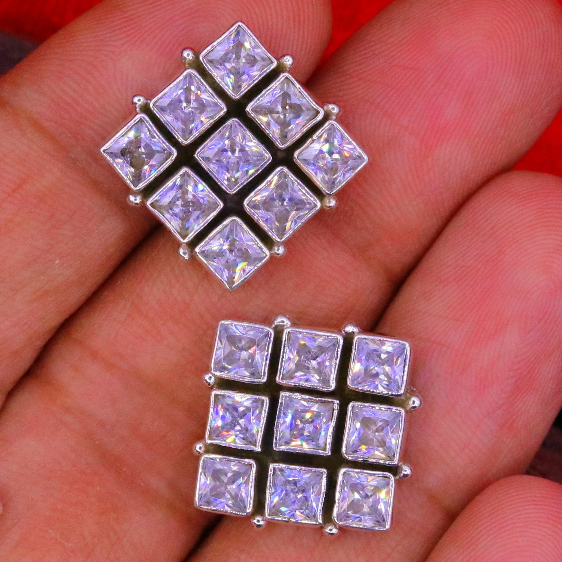 Handmade 925 sterling silver cubic zirconia stud earring with a pendant, elegant jewelry by TRIBAL ORNAMENTS.
