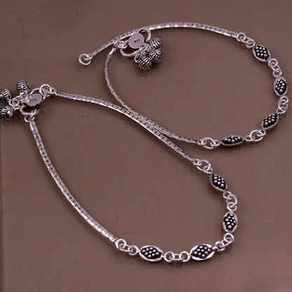 Pair of handmade 925 sterling silver anklets with oxidized design and ankle charms, stylish foot jewelry from Tribal Ornaments.