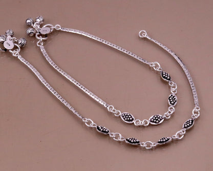 Pair of handmade 925 sterling silver anklets with oxidized tribal designs, stylish ankle charm bracelets for women.