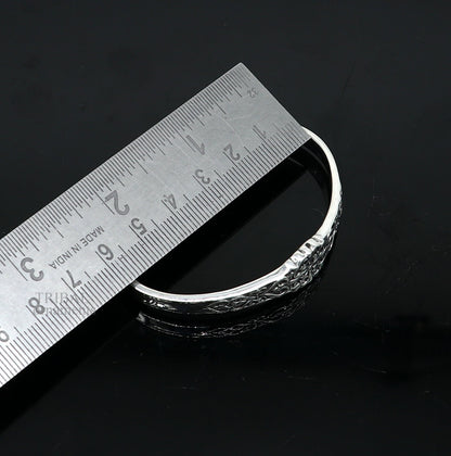 Unisex 925 sterling silver open face cuff bracelet with intricate tribal design, handmade Indian jewelry by TRIBAL ORNAMENTS.