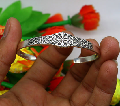 Unisex 925 sterling silver open face cuff bracelet with intricate tribal design, handmade tribal ornaments jewelry.