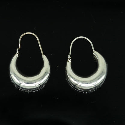 Handmade 925 sterling silver hoop earrings with vintage tribal design, personalized Bali-style jewelry by Tribal Ornaments.