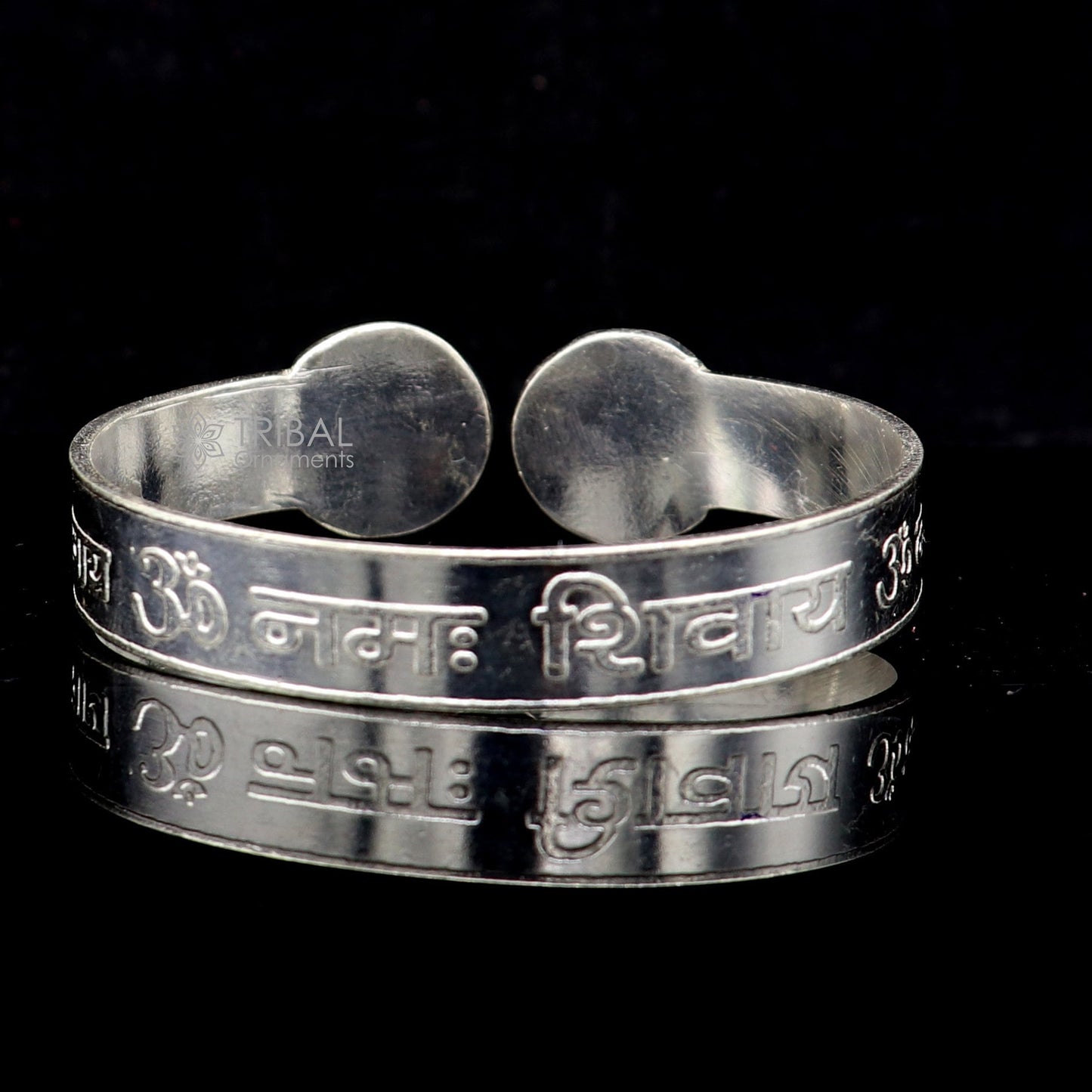 Handmade 925 sterling silver "Aum Namah Shivay" mantra cuff bracelet by Tribal Ornaments, featuring intricate design and divine symbolism.