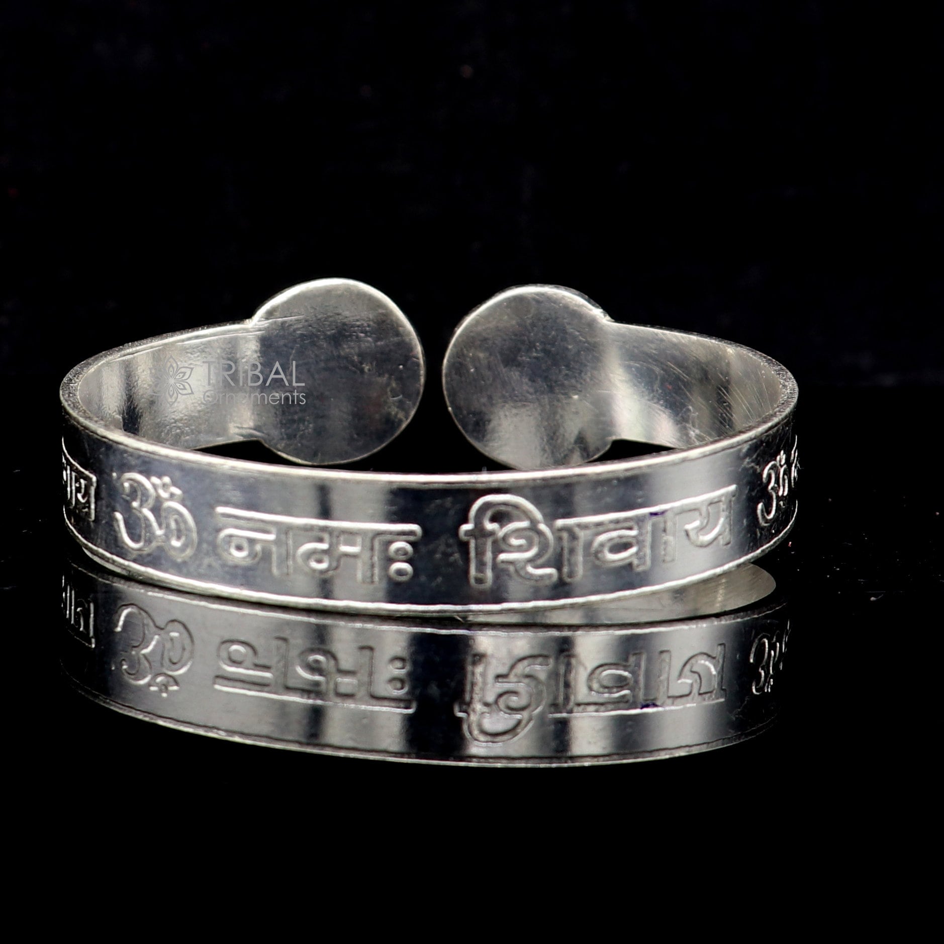 Handmade 925 sterling silver "Aum Namah Shivay" mantra cuff bracelet by Tribal Ornaments, featuring intricate design and divine symbolism.