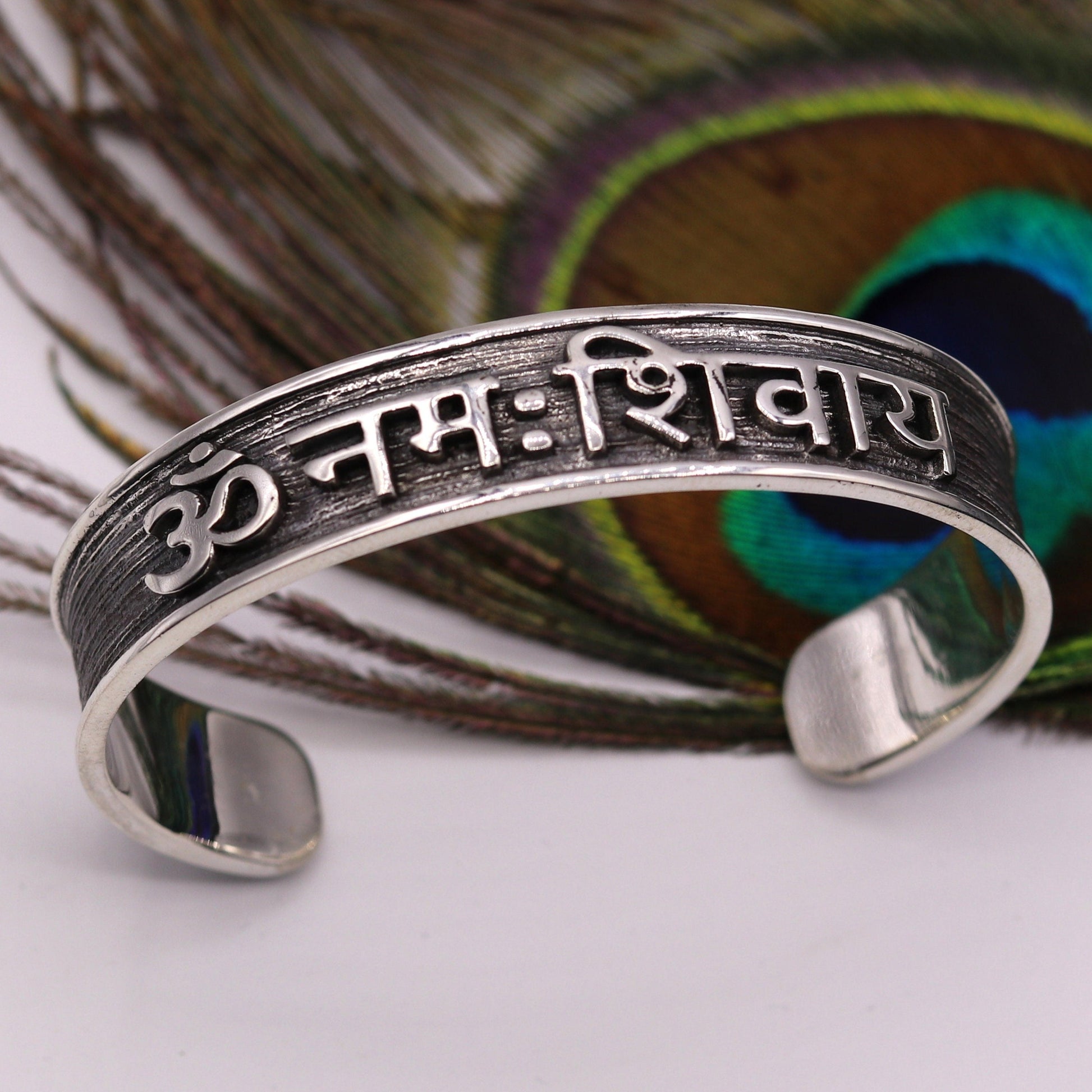 925 Sterling silver mantra "Aum Namah Shivay" open face bangle cuff bracelet by TRIBAL ORNAMENTS, handmade from Rajasthan, India.
