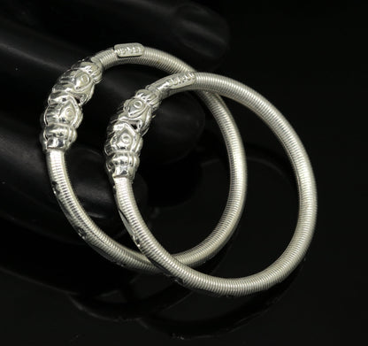 Sterling silver bangle bracelet with handmade crocodile face design, traditional tribal style jewelry for newborns and kids.