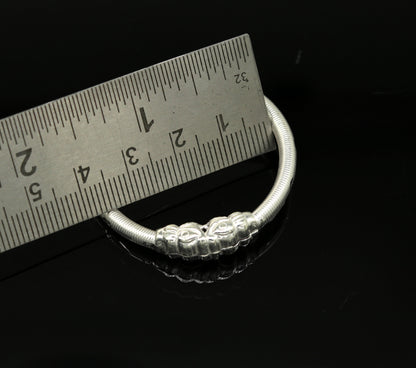 Handmade sterling silver crocodile face bangle bracelet by Tribal Ornaments, traditional style jewelry for newborns and kids, unisex design.