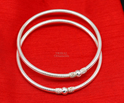 Sterling silver ankle kada bracelet with handmade design and single ball ethnic ornament, tribal ankle jewelry from TRIBAL ORNAMENTS.