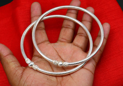 Sterling silver ankle kada bracelet with handmade design and single ball ethnic pattern, featuring tribal ornament craftsmanship.