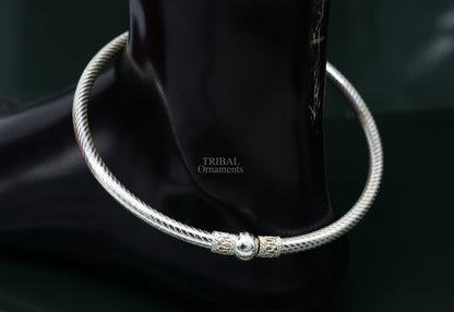 Sterling silver ankle kada bracelet with handmade design and single ball ethnic style, crafted by TRIBAL ORNAMENTS.