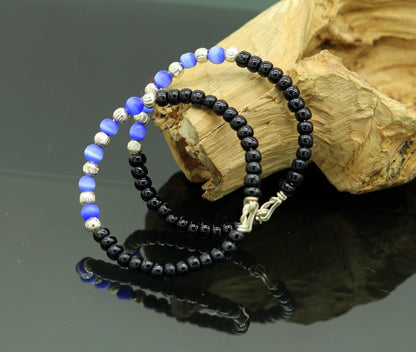 Handmade black beads baby evil eye bracelet by Tribal Ornaments, customized unisex newborn kid's jewelry, perfect for gifting.