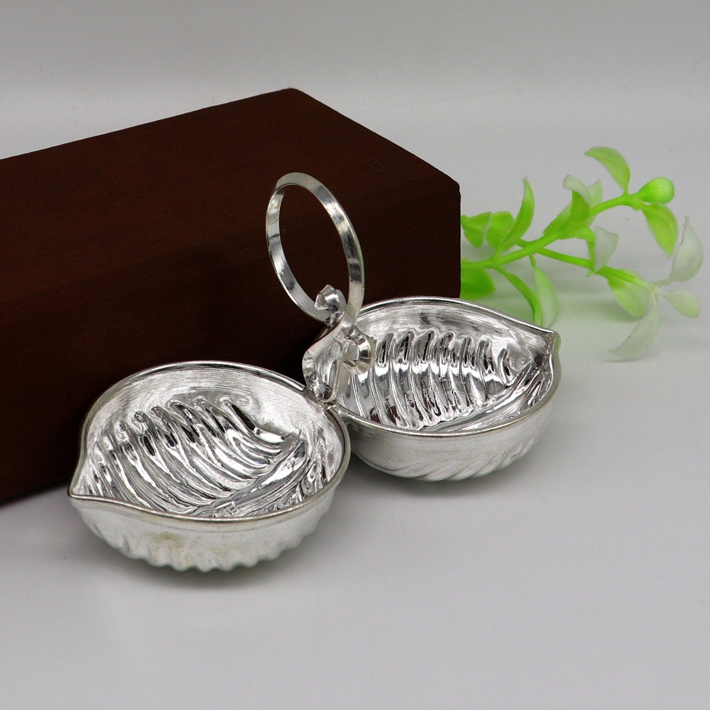 Sterling silver leaf design tilak combo mini bowl and puja utensils for temple rituals, handcrafted by TRIBAL ORNAMENTS.