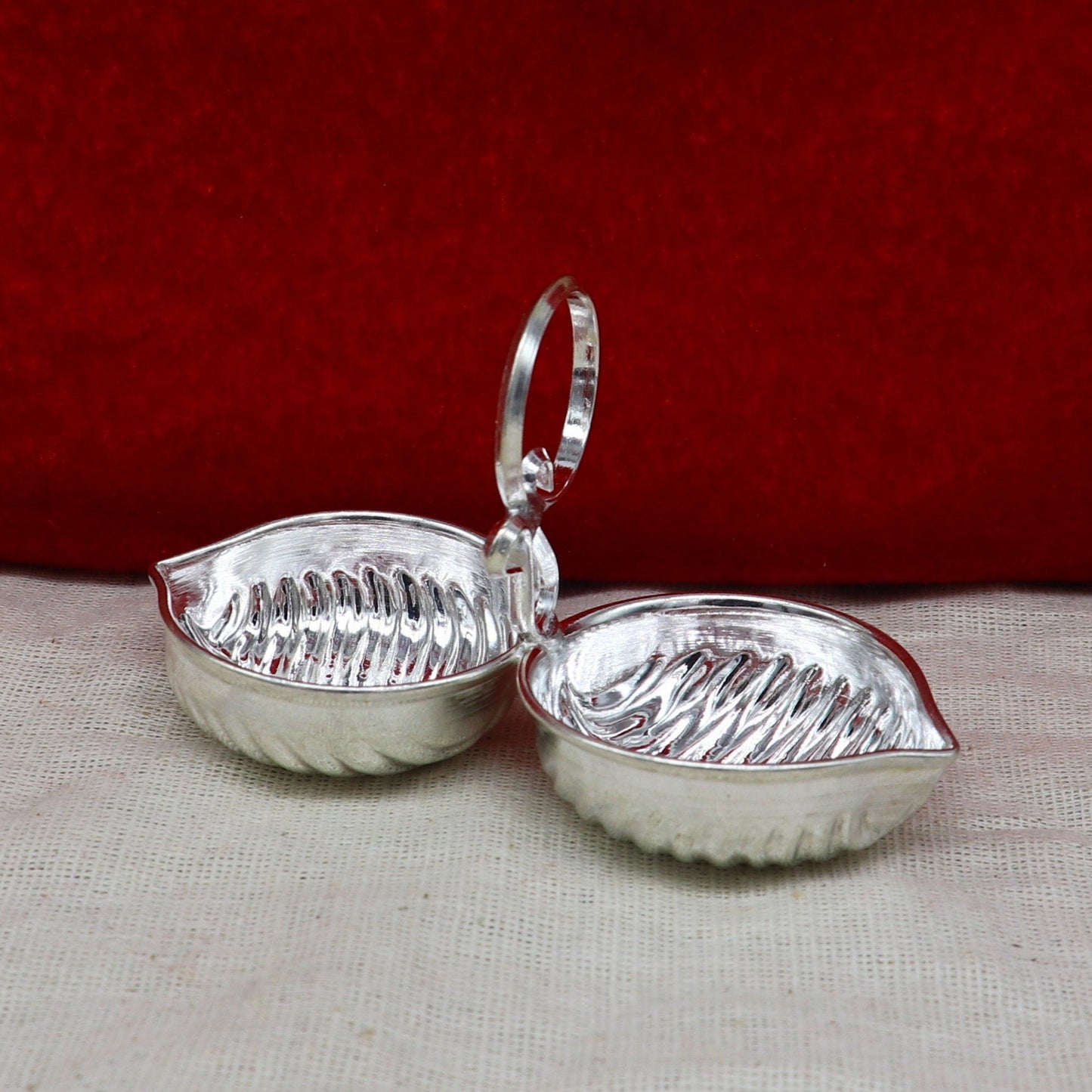 Sterling silver leaf design tilak combo mini bowl and tilak patra for puja, handcrafted by Tribal Ornaments, traditional temple utensils.