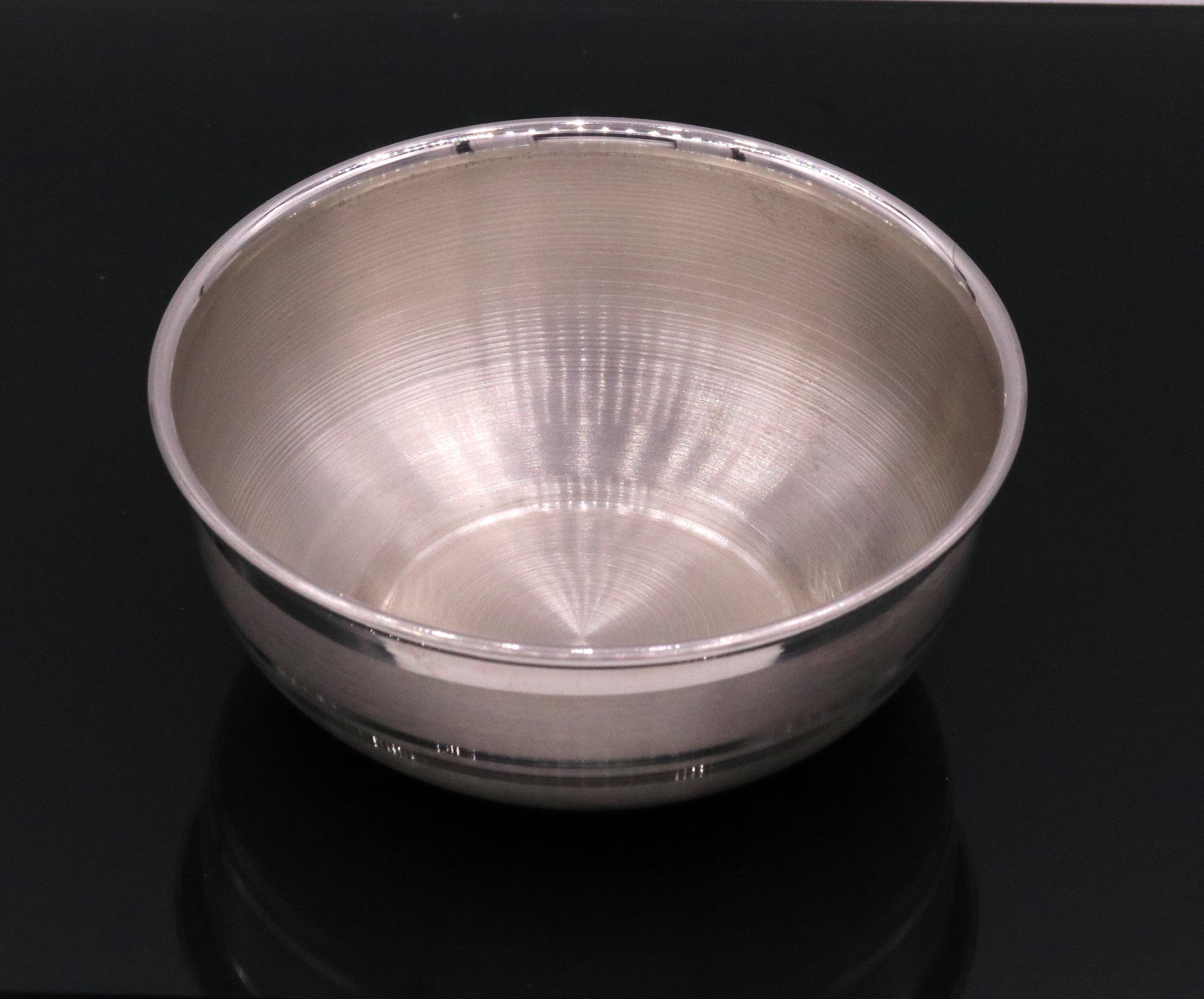 Handmade pure 999 silver bowl from India, high-quality silver kitchen utensil with plain finish, part of TRIBAL ORNAMENTS silver vessels collection.