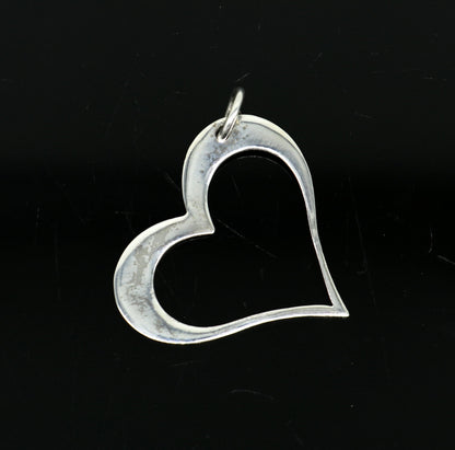 Sterling silver heart pendant from Tribal Ornaments, stylish unisex jewelry with personalized design, handmade from India.