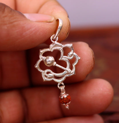 Sterling silver Aum mantra Rudraksha pendant, vintage designer jewelry with intricate detailing, handmade Indian tribal ornament.