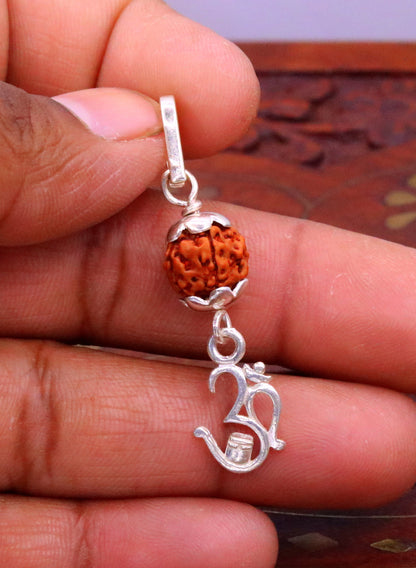 Sterling silver Aum mantra Rudraksha pendant, vintage handmade tribal jewelry from India with intricate design.