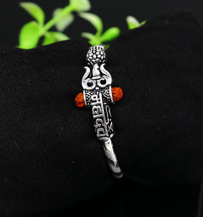 Handmade vintage silver baby bangle with Lord Shiva Mahadeva design, customized tribal ornament bracelet ideal for gifting.