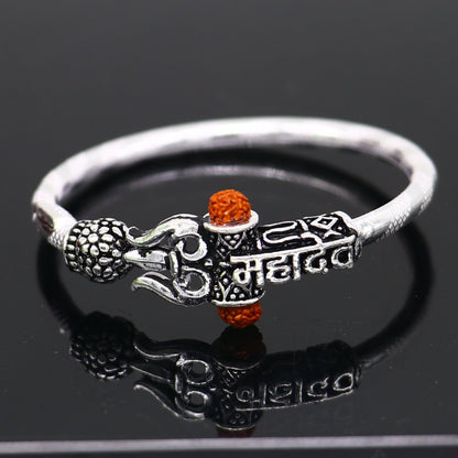 Handmade vintage silver baby bangle with Lord Shiva Mahadeva design, customized tribal ornament bracelet for gifting.