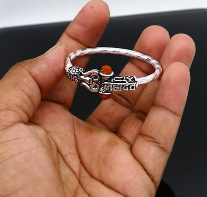Handmade vintage silver baby bangle with Lord Shiva Mahadeva design, customized tribal ornament bracelet for gifting.